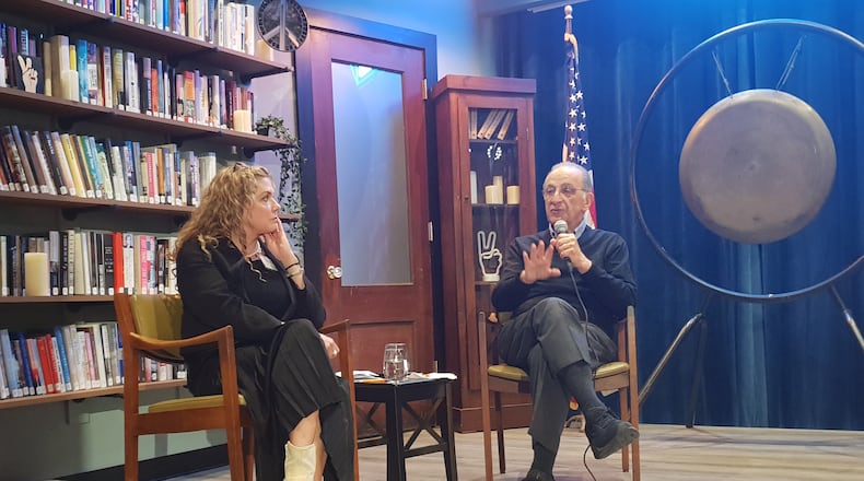 James Zogby speaks during a question and answer portion during a Sunday event at the International Peace Museum in Dayton as executive director Alice Young-Basora looks on. CONTRIBUTED