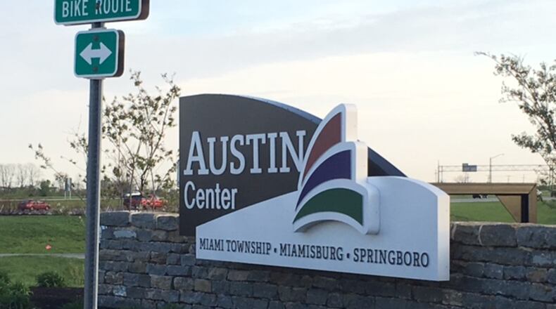 Miami Twp. recently accepted a proposal from Austin Landing’s developer for short-term deal for exclusive rights to market a large tract of land at the interchange near the sprawling mixed retail center off Interstate 75. NICK BLIZZARD/STAFF