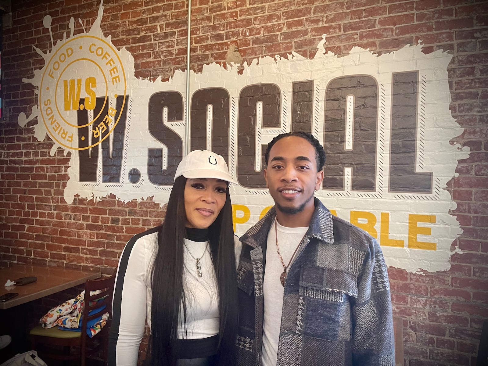 Patricia Wafer and her son, Devontae Morton, are the new owners of The Tap at W. Social Tap & Table in Dayton. NATALIE JONES/STAFF