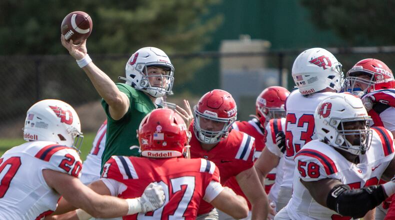 Dayton quarterback Drew VanVleet throws from the pocket during Sunday's annual spring game. Jeff Gilbert/CONTRIBUTED
