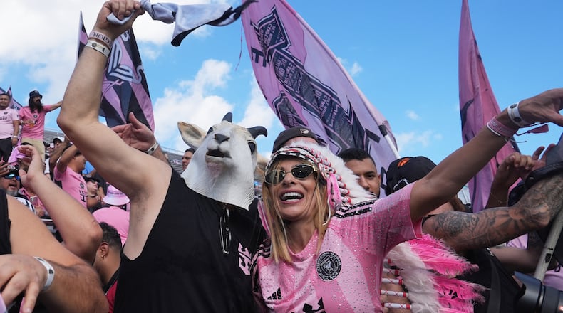Inter Miami fans cheer before the MLS Cup final soccer match against the Vancouver Whitecaps Saturday, Dec. 6, 2025, in Fort Lauderdale, Fla. (AP Photo/Marta Lavandier)
