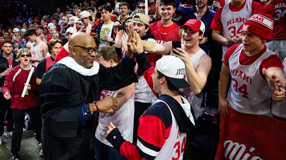 Miami legend Ron Harper interacts with fans before their game against Northern Illinois on Saturday, Jan. 31, 2026 at Millett Hall. Harper was awarded an honorary doctorate from the university. JEREMY MILLER / CONTRIBUTED PHOTO