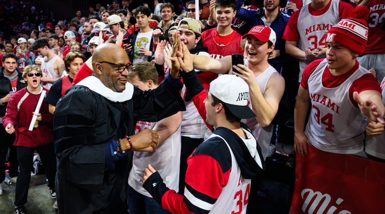 Miami legend Ron Harper interacts with fans before their game against Northern Illinois on Saturday, Jan. 31, 2026 at Millett Hall. Harper was awarded an honorary doctorate from the university. JEREMY MILLER / CONTRIBUTED PHOTO