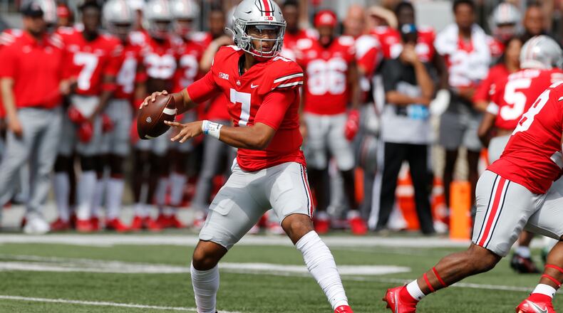 Ohio State quarterback C.J. Stroud drops back to pass against Oregon during the first half of an NCAA college football game Saturday, Sept. 11, 2021, in Columbus, Ohio. (AP Photo/Jay LaPrete)