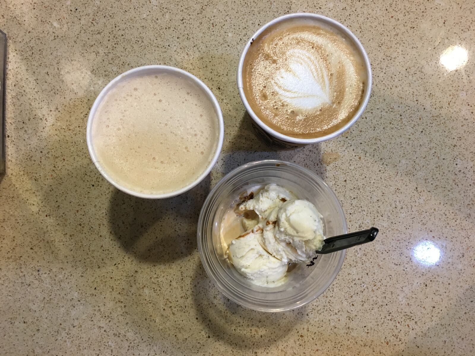 Pictured here (from left to bottom): chai latte, vanilla-cinnamon latte and affogato (vanilla bean ice cream with espresso poured on top)