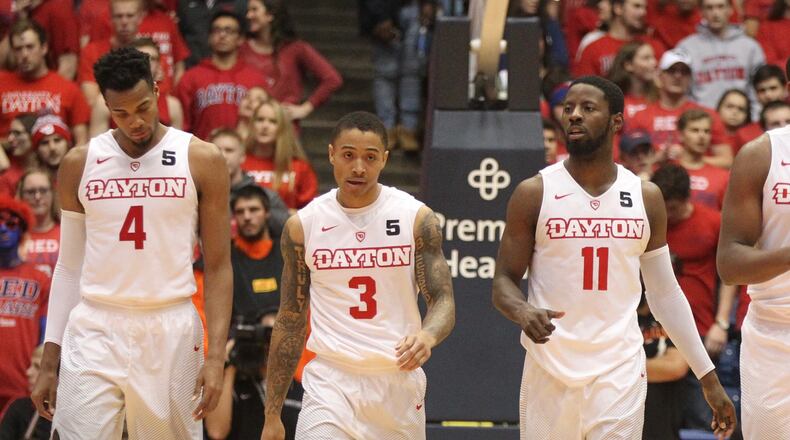 Dayton seniors Charles Cooke, Kyle Davis, Scoochie Smith and Kendall Pollard head up up the court after a defensive stop against Winthrop on Saturday, Dec. 3, 2016, at UD Arena in Dayton. David Jablonski/Staff