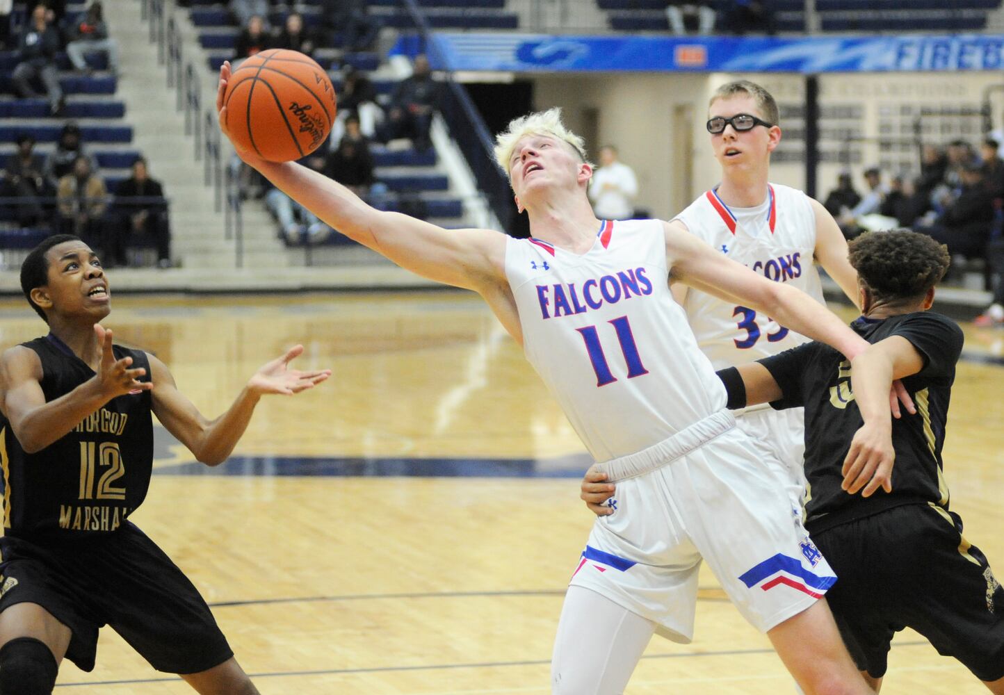 PHOTOS: Thurgood Marshall vs. Clinton-Massie boys basketball