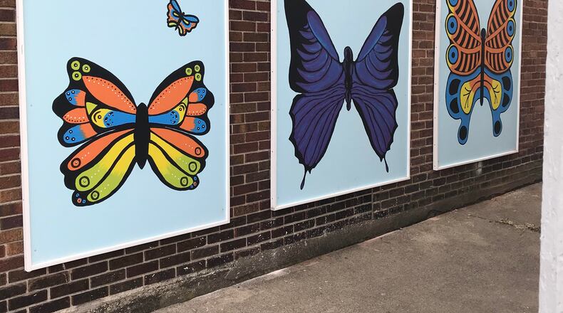 Miamisburg Art Gallery, which is incorporated as a non-profit organization. made colorful changes and additions to its exterior, adding a two-story tall sign on the north side of its building at 16 N. Main St. and mounting three artworks depicting butterflies on its south side. CONTRIBUTED