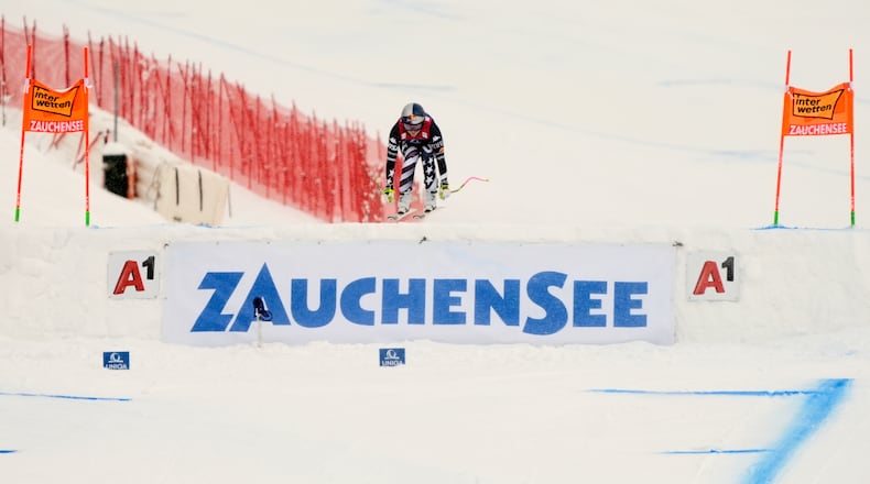United States' Lindsey Vonn is airborne as she speeds down the course to win an alpine ski, women's World Cup downhill, in Zauchensee, Austria, Saturday, Jan. 10, 2026. (AP Photo/Giovanni Auletta)