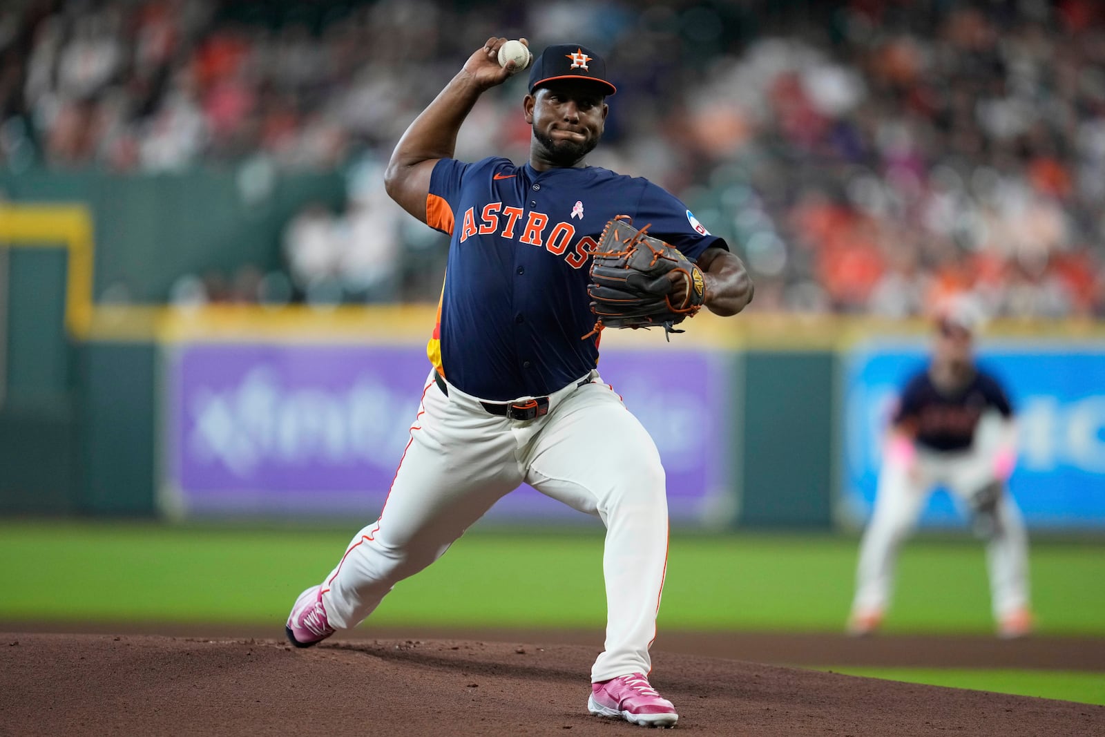 Houston Astros starting pitcher Ronel Blanco throws during the first inning of a baseball game against the Cincinnati Reds in Houston, Sunday, May 11, 2025. (AP Photo/Ashley Landis)