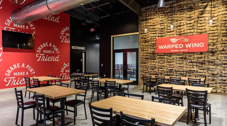 Look inside the new Warped Wing Brewery & Smokery, located at 6602 Executive Boulevard in Huber Heights near the Rose Music Center. The Huber Heights brewery will be Warped Wing’s fourth location. TOM GILLIAM / CONTRIBUTING PHOTOGRAPHER