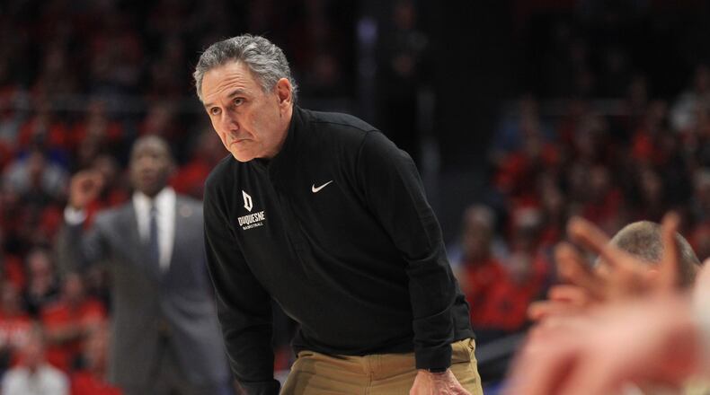 Duquesne's Keith Dambrot coaches during a game against Dayton on Saturday, Feb. 23, 2020, at UD Arena. David Jablonski/Staff