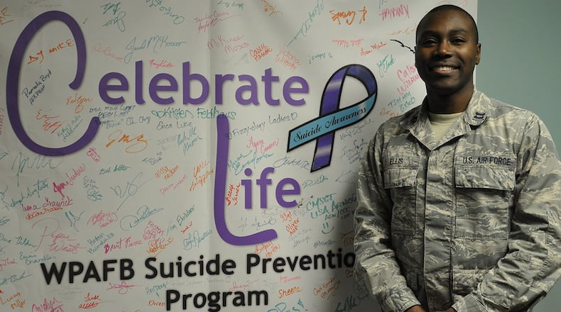 Capt. Gary Ellis, Wright-Patterson Air Force Base Suicide Prevention Program manager, stands in front of the Celebrate Life poster in the Wright-Patterson Medical Center Mental Health Clinic. The Suicide Prevention Program is an element of the Individual Delivery System, or IDS, which is a collaboration of base helping agencies that provide care to Airmen and their families. (U.S. Air Force photo/Staff Sgt. Whitney Trimble)