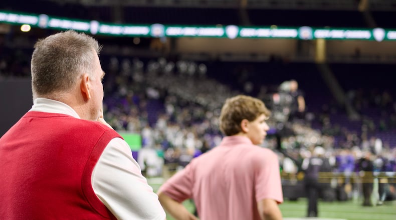 Miami head coach Chuck Martin looks onto Ford Field as Ohio celebrates a MAC championship win over Miami. Kasey Turman/CONTRIBUTED