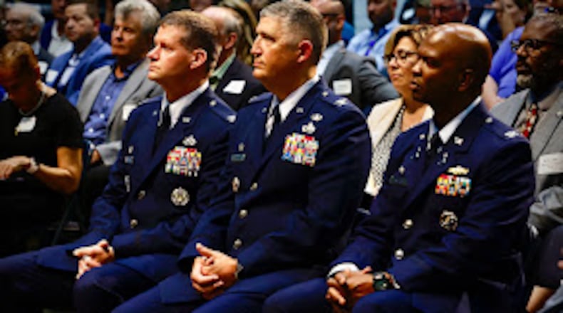 In the front row, three colonels who serve at Wright-Patterson Air Force Base. From the left, Col. Dustin Richards, commander of the 88th Air Base Wing; Col. Kenneth Stremmel, commander of the National Air and Space Intelligence Center, and Col. Marcus Starks, commander of the National Space Intelligence Center. MARSHALL GORBY/STAFF