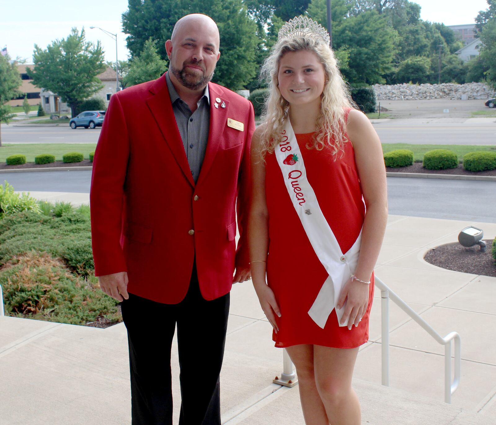 Brooke Klopfensten is the 2018 Strawberry Festival Queen.  She is pictured with  Troy Strawberry Festival General Chairman Eric Roetter.