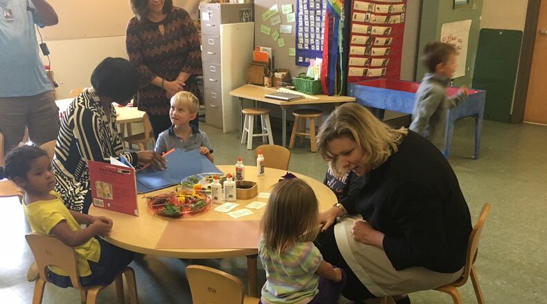 Dayton Mayor Nan Whaley works with preschoolers at the University of Dayton’s Bombeck Center after giving a third-year update on her City of Learners program in September. JEREMY P. KELLEY / STAFF