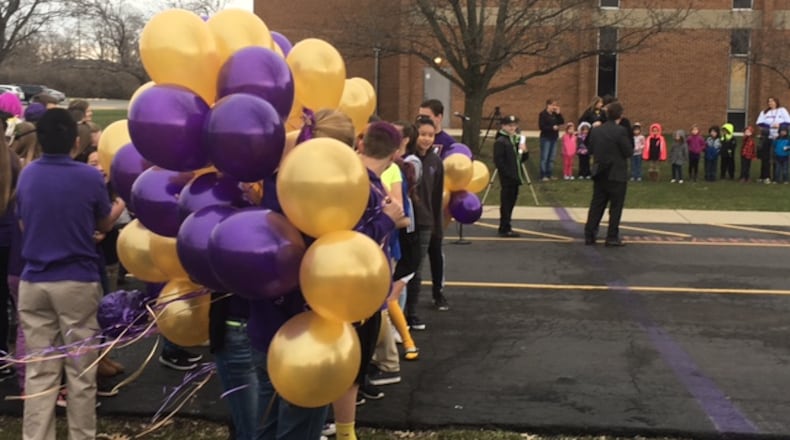 Dayton Christian School students took part in a balloon launch Monday as the school announced the start of a $6 million capital campaign to build a gym. NICK BLIZZARD/STAFF