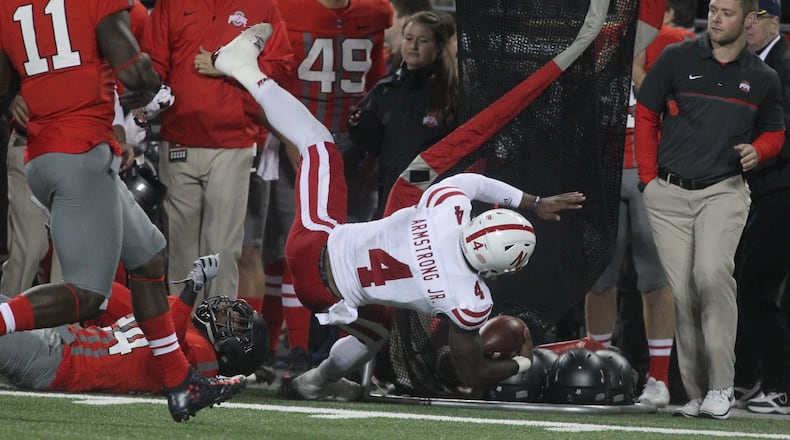 Nebraska quarterback Tommy Armstrong is tackled and hurt on this play. David Jablonski/Staff