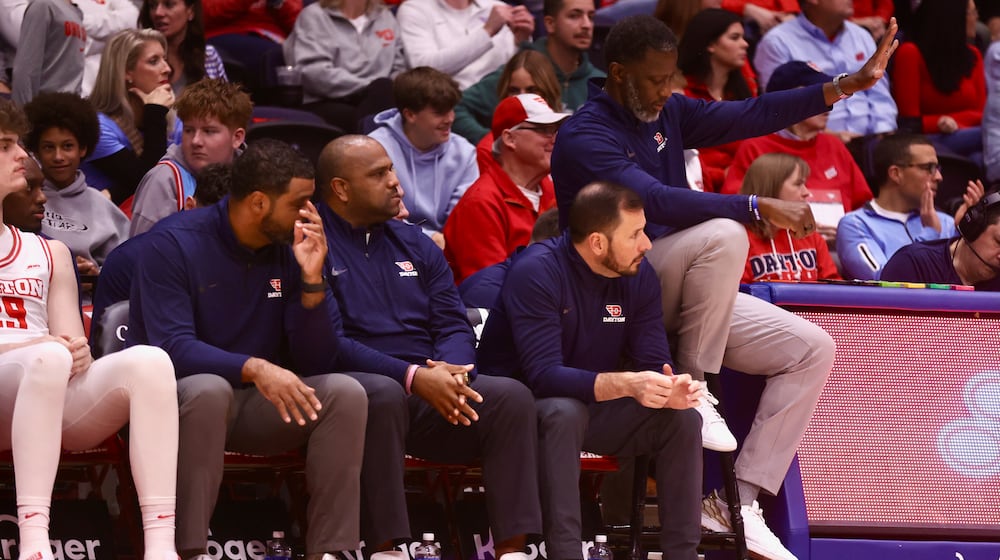 Dayton's Anthony Grant and his staff coach during a game against North Carolina Central on Saturday, Nov. 22, 2025, at UD Arena. David Jablonski/Staff