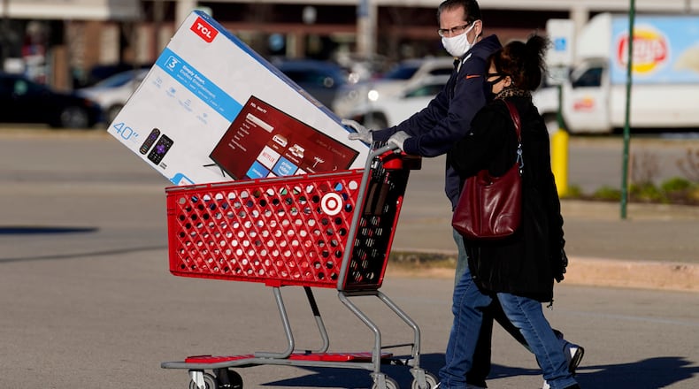 Holiday season is upon us and stores have started releasing Thanksgiving and Black Friday store hours. (Associated Press)
