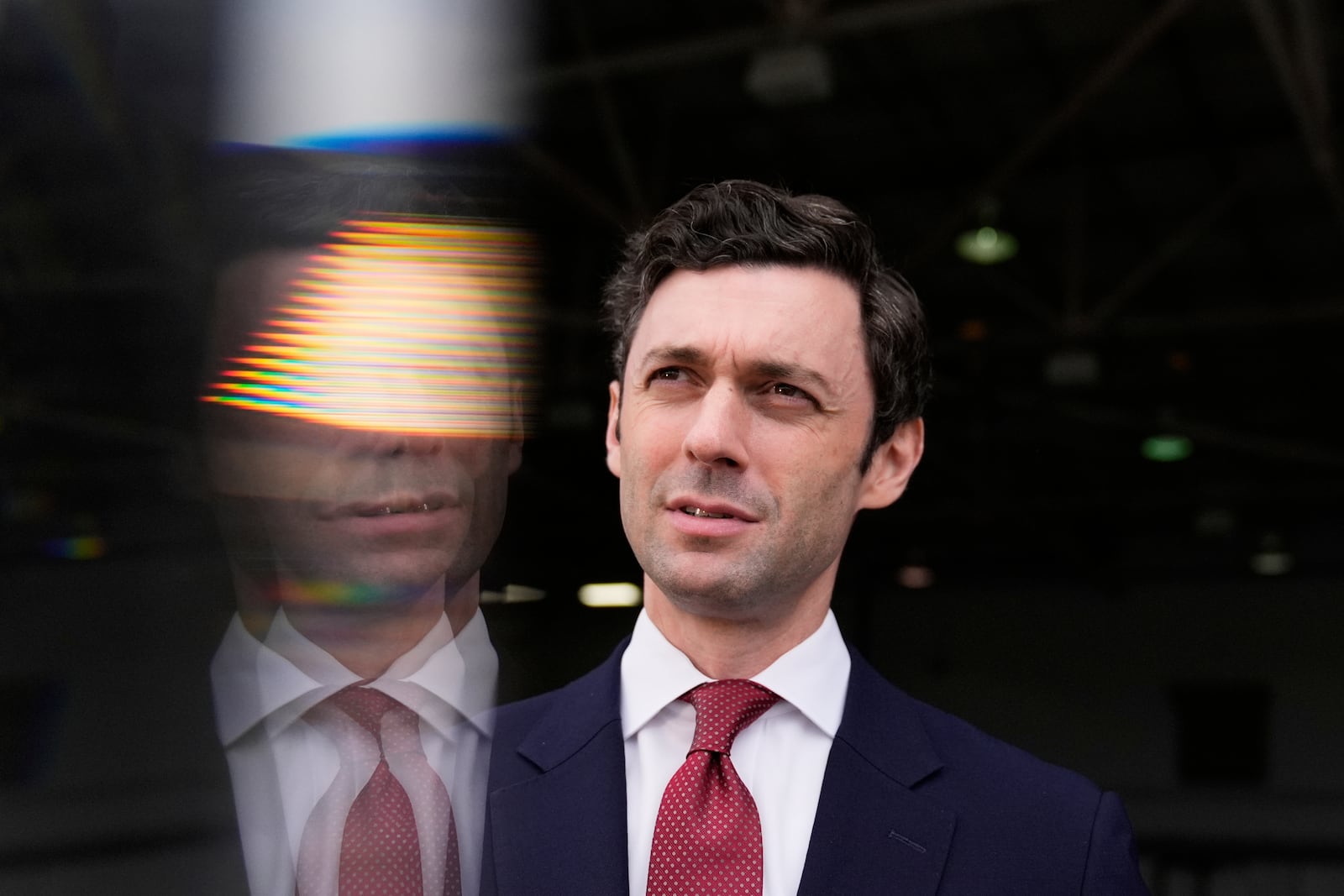 Sen. Jon Ossoff, D-Ga., speaks during an interview at Dobbins Air Reserve Base, Saturday, April 26, 2025, in Marietta, Ga. (AP Photo/Brynn Anderson)
