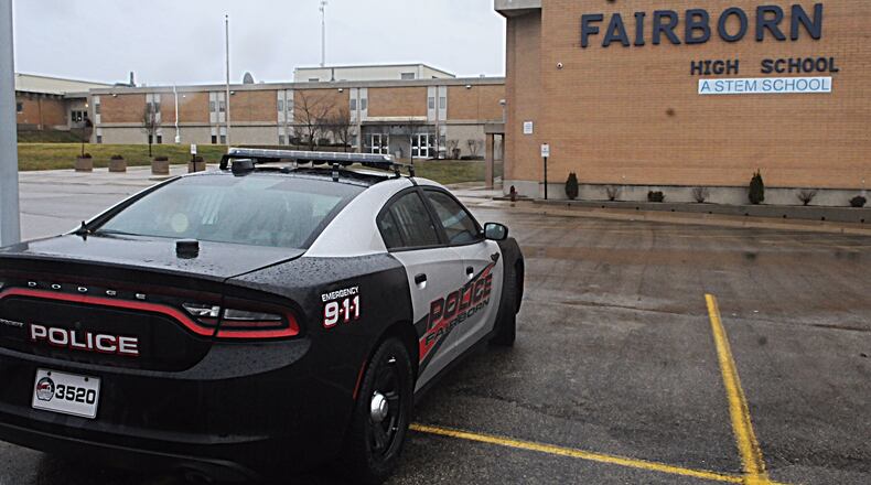 Two middle school students were arrested and charged in Fairborn on Thursday, Feb. 22, 2018. A lockdown was in place at Fairborn High School due to a social media post that indicated students and teachers were possibly in danger, Fairborn police said. MARSHALL GORBY/STAFF