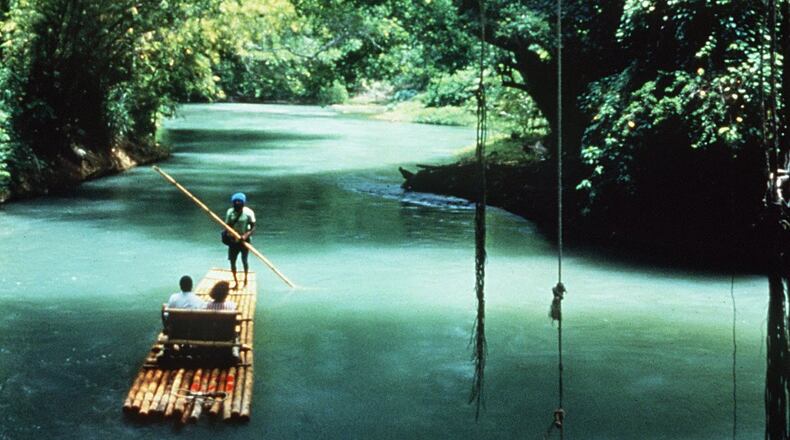 Could an increase in international visitors to Cuba also boost interest in travel to Jamaica? Tourists are shown rafting on Jamaica’s Martha Brae. (Courtesy of the Jamaica Tourism Board/TNS)