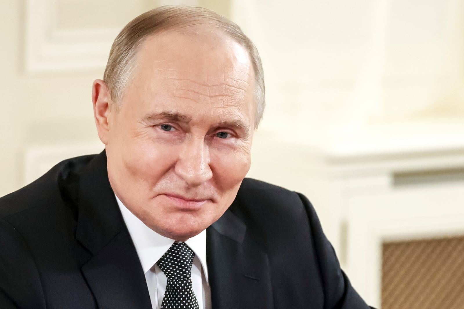Russian President Vladimir Putin meets with the heads of international news agencies at the newly renovated St. Petersburg Rimsky-Korsakov State Conservatory on the sidelines of the St. Petersburg International Economic Forum in St. Petersburg, Russia, early Thursday, June 19, 2025. (Vyacheslav Prokofyev, Sputnik, Kremlin Pool Photo via AP)