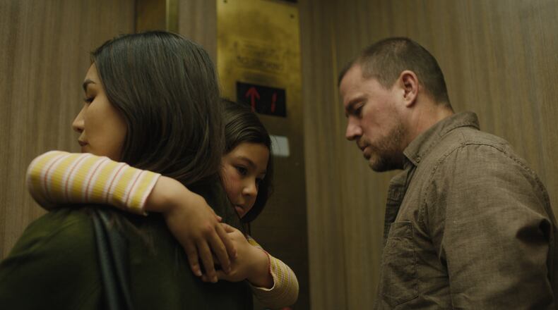 Gemma Chan, from left, Mason Reeves and Channing Tatum appear in a scene from the film "Josephine," by Beth de Araújo, an official selection of the 2026 Sundance Film Festival. (Sundance Institute/Greta Zozula via AP)