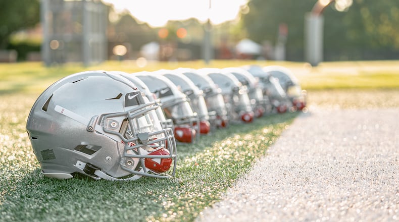 Ohio State football helmets set up at practice