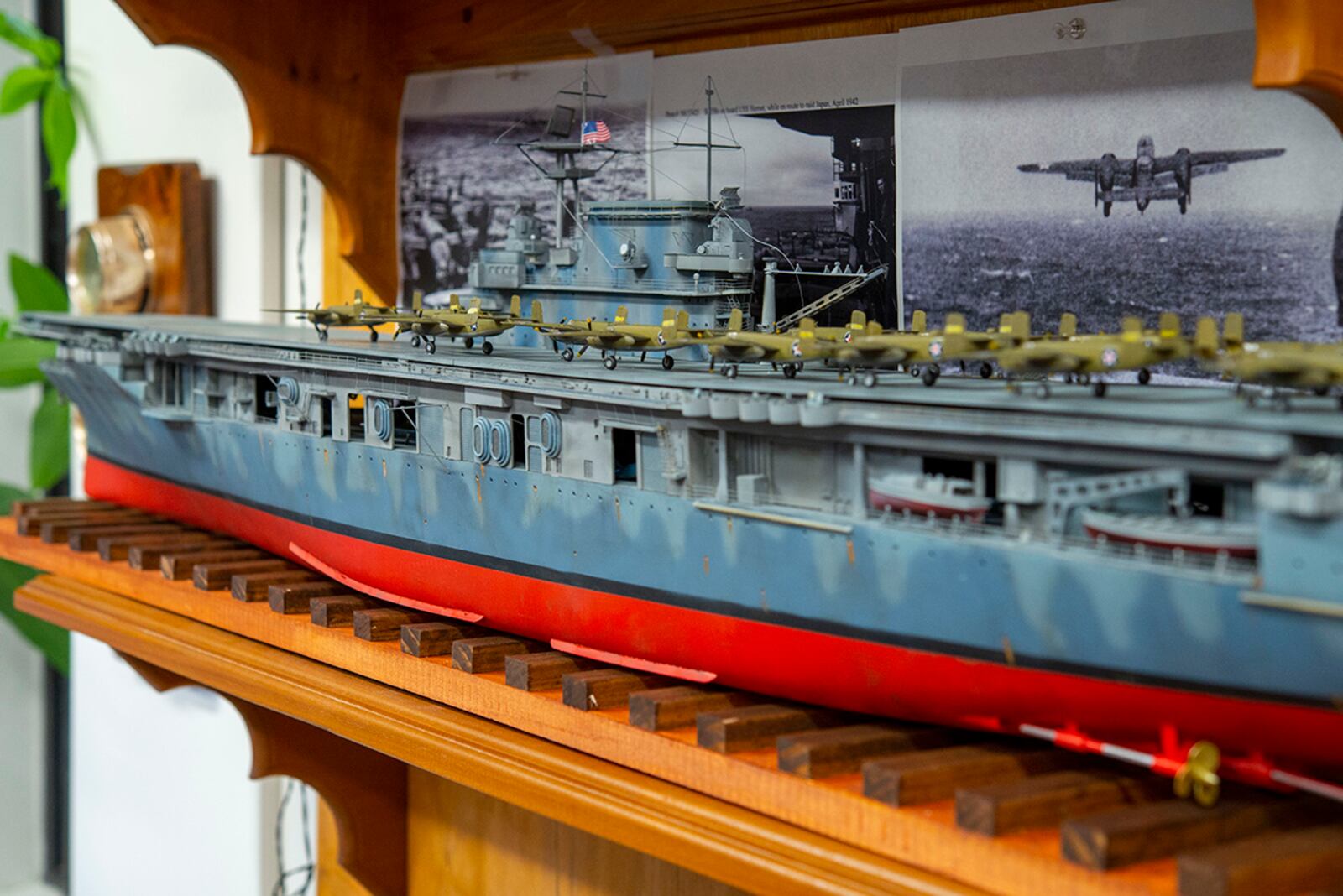 A 4.5-foot model of the aircraft carrier USS Hornet sits on display recently in Building 15 at Wright-Patterson Air Force Base. David Frank, the 788th Civil Engineer Squadron’s Emergency Management chief, built a collection of models for the 80th anniversary of the Doolittle Raid. U.S. AIR FORCE PHOTO/SENIOR AIRMAN JACK GARDNER