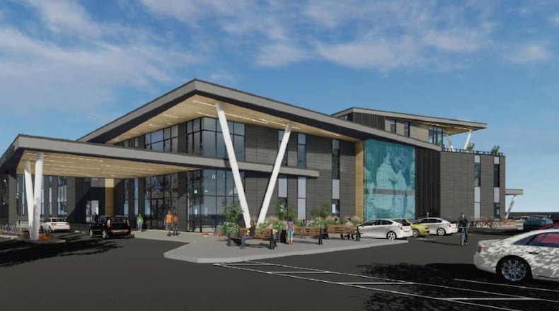 A rendering of the Five Rivers Health Centers new headquarters planned for West Dayton. CONTRIBUTED.