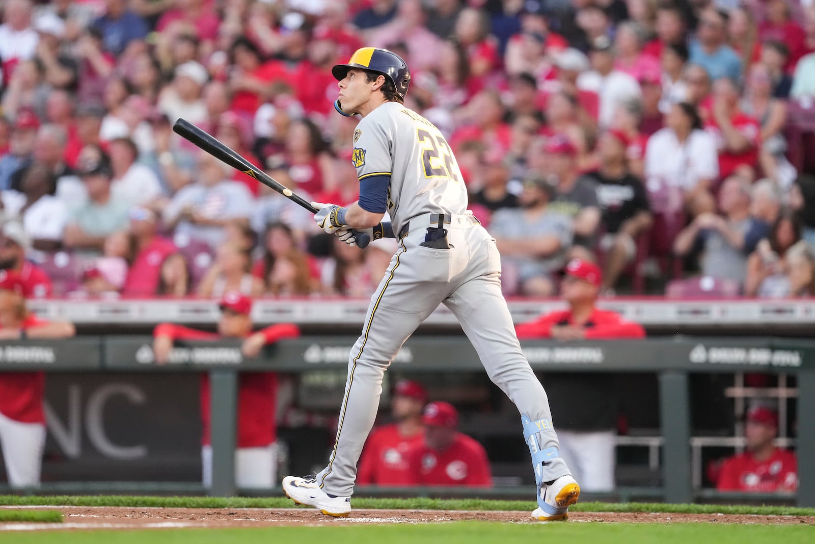Milwaukee Brewers' Christian Yelich watches his solo home run during the third inning of a baseball game against the Cincinnati Reds, Monday, June 2, 2025, in Cincinnati. (AP Photo/Jeff Dean)