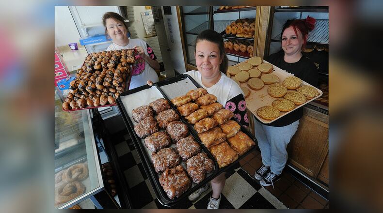 Stan the Donut Man is preparing for National Donut Day on Friday, June 7. Pictured (left to right) is Gretchen Crain, Lindsey Roberts and Ashley Cooper. MARSHALL GORBY\STAFF