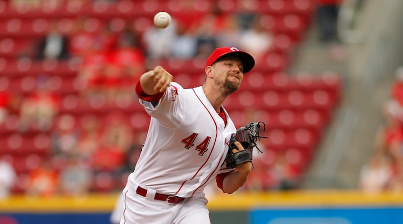 Reds starter Mike Leake pitches against the Phillies on Monday, June 8, 2015, at Great American Ball Park in Cincinnati. David Jablonski/Staff
