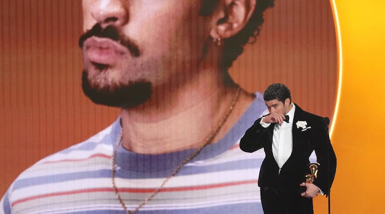 Bad Bunny accepts the award for album of the year for "Debí Tirar Más Fotos" during the 68th annual Grammy Awards on Sunday, Feb. 1, 2026, in Los Angeles. (AP Photo/Chris Pizzello)