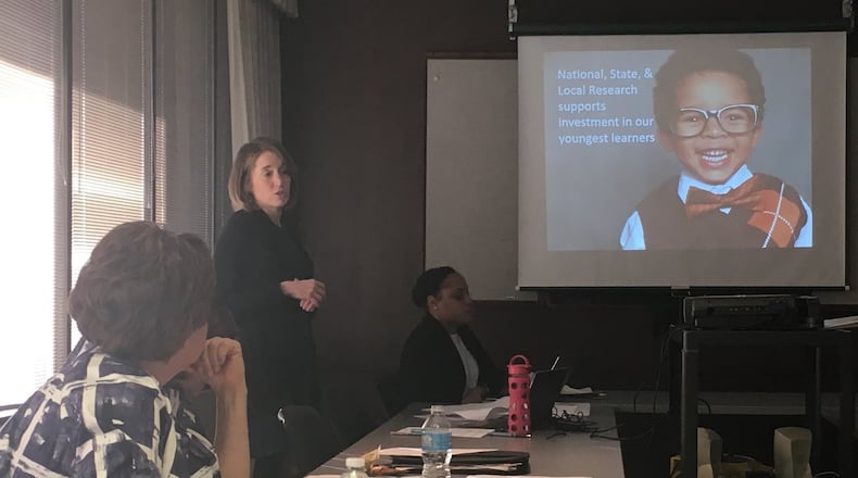 Robyn Lightcap, executive director of Learn to Earn Dayton, explains research on the effectiveness of early childhood education to the new Preschool Promise board at the group’s first meeting, Jan. 4, 2017. JEREMY P. KELLEY / STAFF