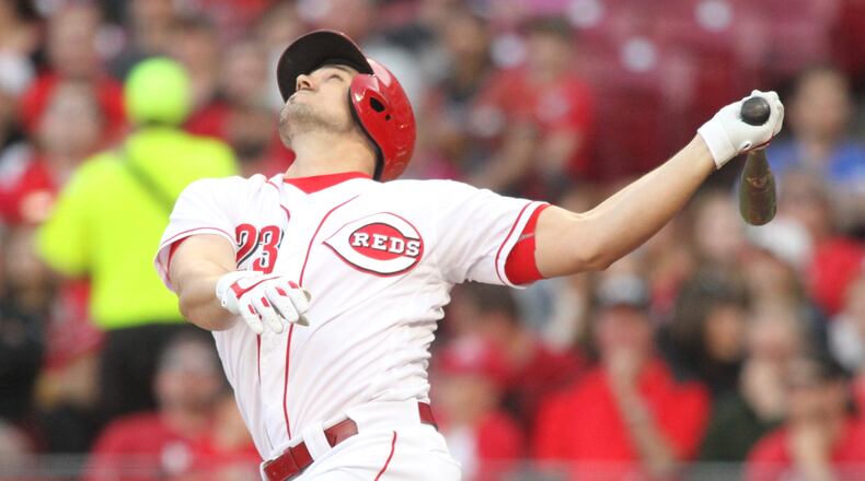 The Reds’ Adam Duvall swings against the Mets on Monday, May 7, 2018, at Great American Ball Park in Cincinnati. David Jablonski/Staff