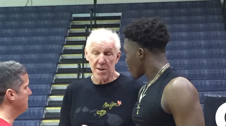 ESPN’S Bill Walton with Dayton’s Jordy Tshimanga on Sunday at the Maui Invitational. Larry Hansgen/STAFF