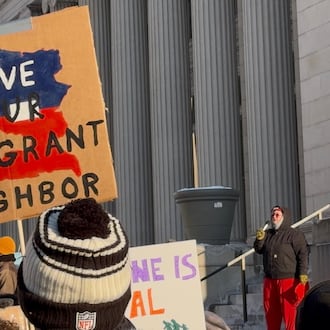 A rally outside Congressman Mike Turner's office on Jan. 30 during the national shutdown in protest of ICE saw more than 300 attendees. SYDNEY DAWES/STAFF