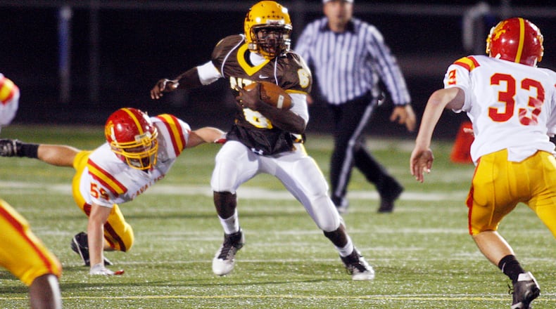 Alter's Malik Zaire gains yards on Purcell Marian at Springboro High School on Thursday, Sept. 15.