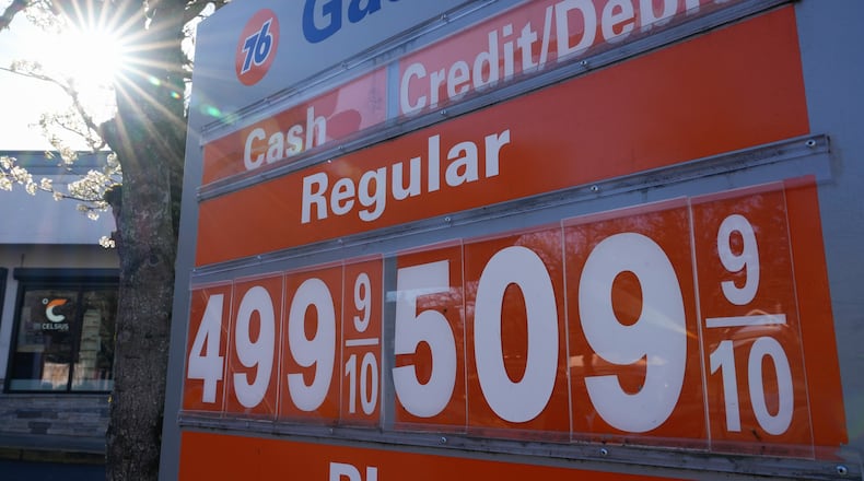 Gasoline prices are displayed at a gas station on Monday, March 16, 2026, in Portland, Ore. (AP Photo/Jenny Kane)