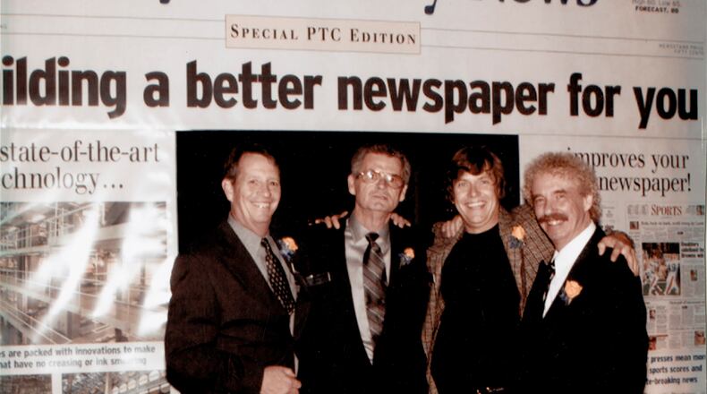 Dale Huffman (far right) with (from left) columnist D.L. Stewart, sports writer Hal McCoy and cartoonist Mike Peters.