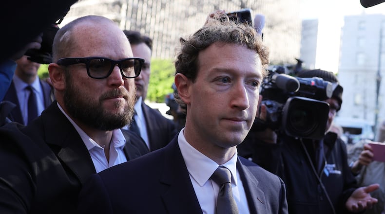 Meta CEO Mark Zuckerberg arrives for a landmark trial over whether social media platforms deliberately addict and harm children, Wednesday, Feb. 18, 2026, in Los Angeles. (AP Photo/Ryan Sun)
