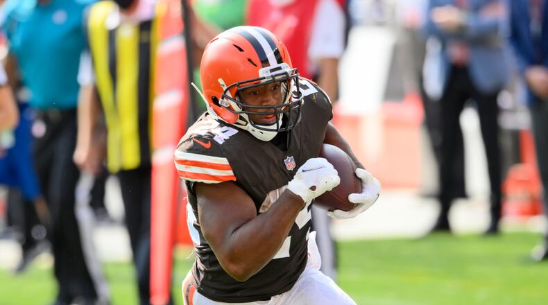 Cleveland Browns running back Nick Chubb rushes for a 20-yard touchdown during the second half of an NFL football game against the Washington Football Team, Sunday, Sept. 27, 2020, in Cleveland. (AP Photo/David Richard)
