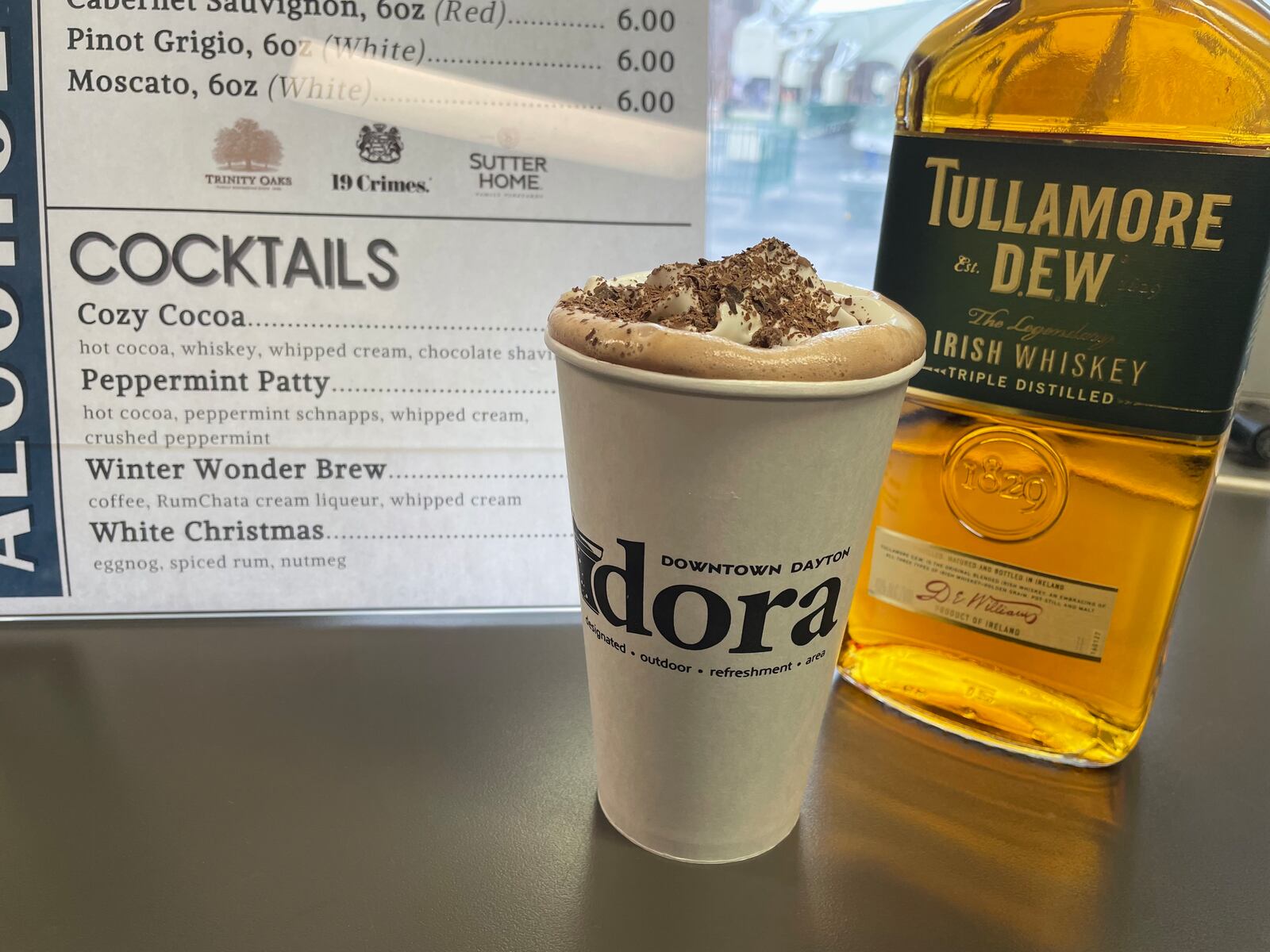 With scenic views of downtown Dayton and the Great Miami River, guests 21 and older can now enjoy a holiday cocktail at RiverScape MetroPark. Pictured is the Cozy Cocoa. NATALIE JONES/STAFF