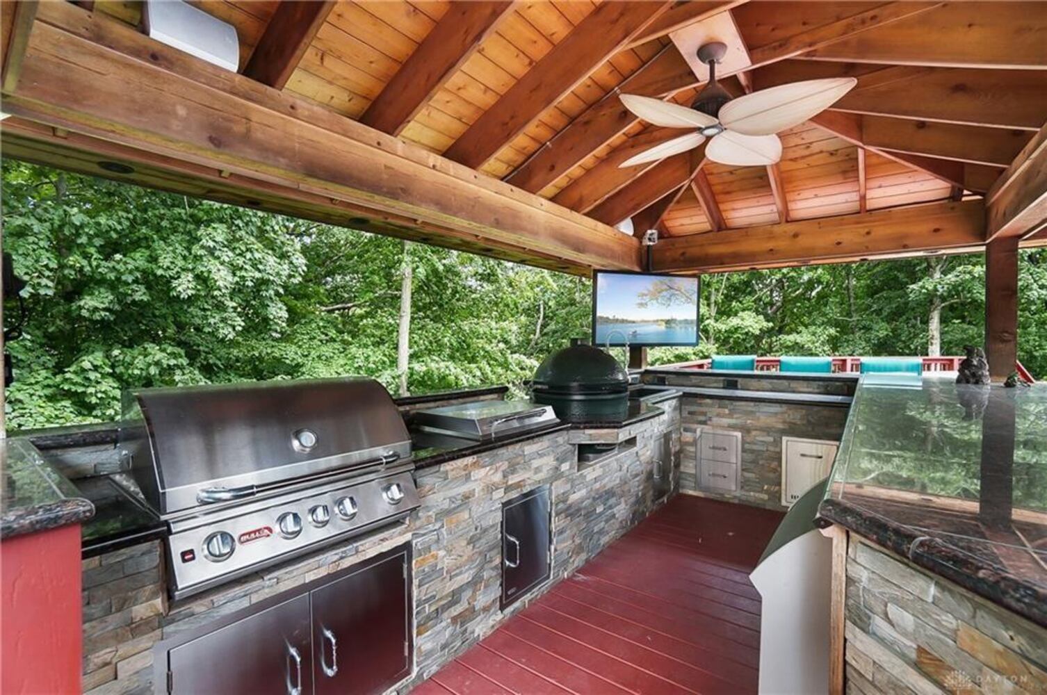 PHOTOS: Spectacular $1.8M luxury home on market with pool, golf simulator