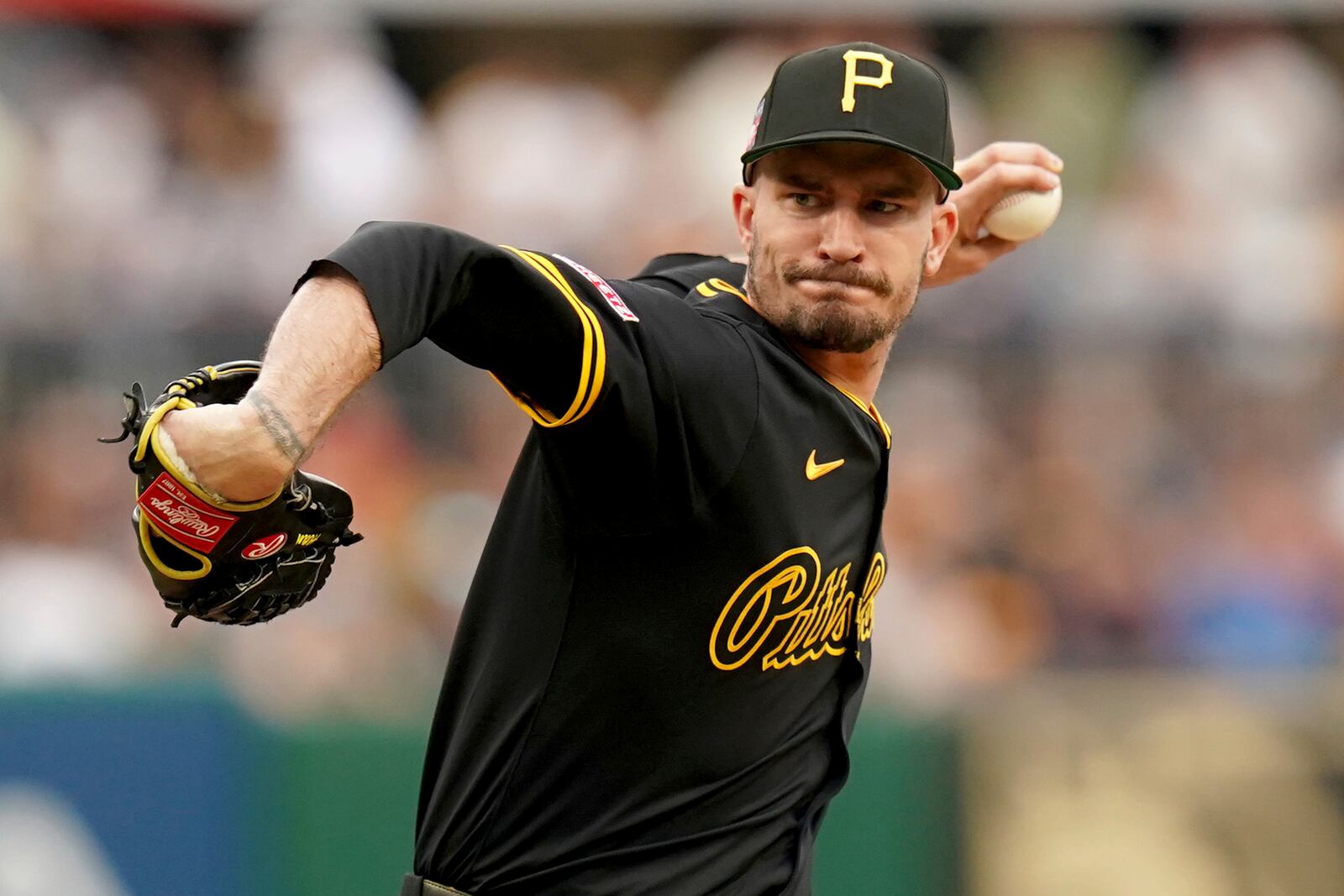 Pittsburgh Pirates pitcher Andrew Heaney delivers during the first inning of a baseball game against the Arizona Diamondbacks, Saturday, July 26, 2025, in Pittsburgh. (AP Photo/Matt Freed)