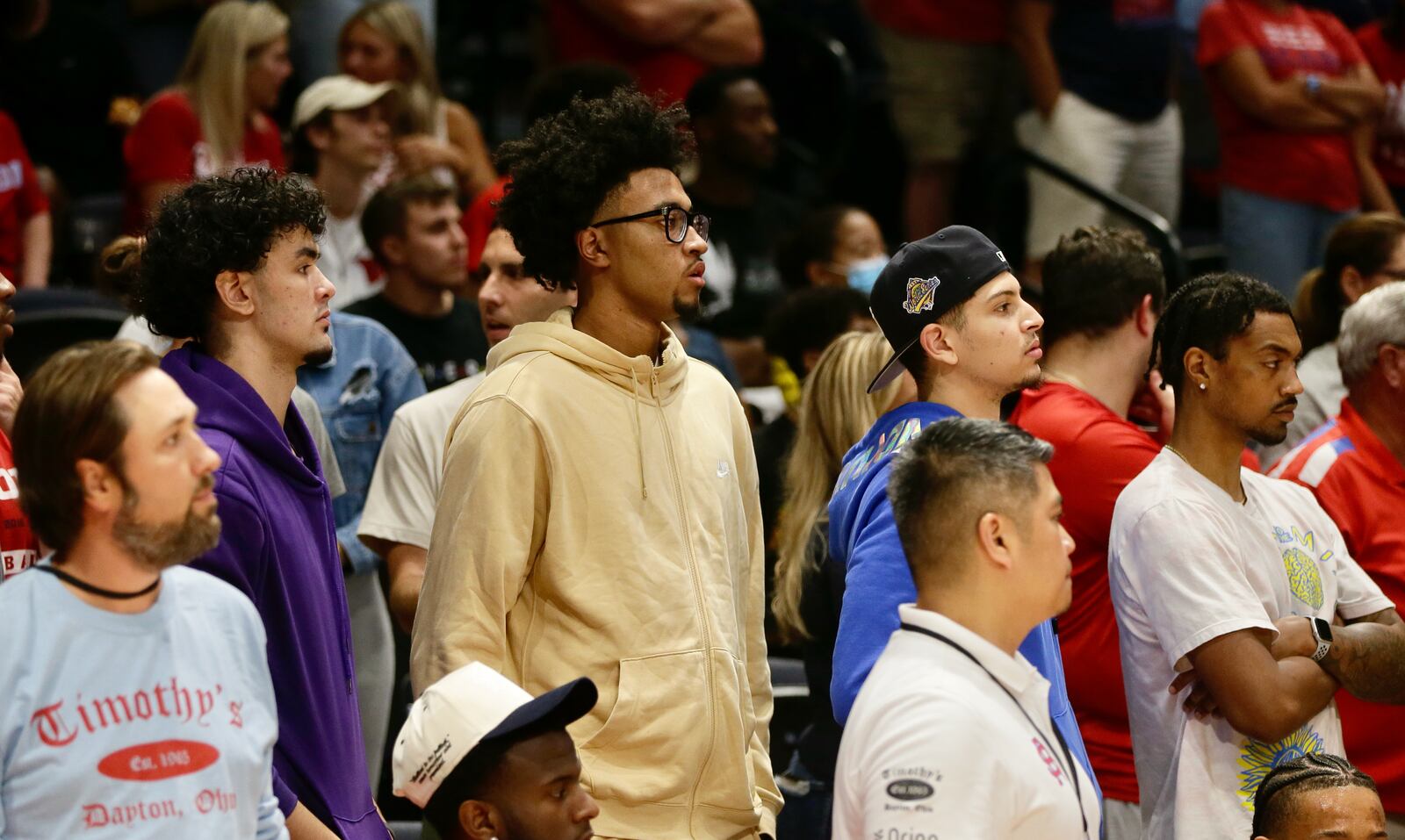Jazz Gardner, center, a 2023 recruit, watches the Red Scare play The Money Team on Wednesday, July 27, in the third round of The Basketball Tournament at UD Arena in Dayton. David Jablonski/Staff